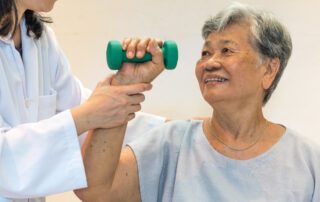 elderly woman getting physical therapy - pt for seniors concept